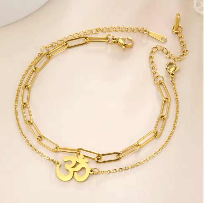 PULSEIRA OM EM AÇO INOXIDÁVEL – PRESENÇA E EQUILÍBRIO