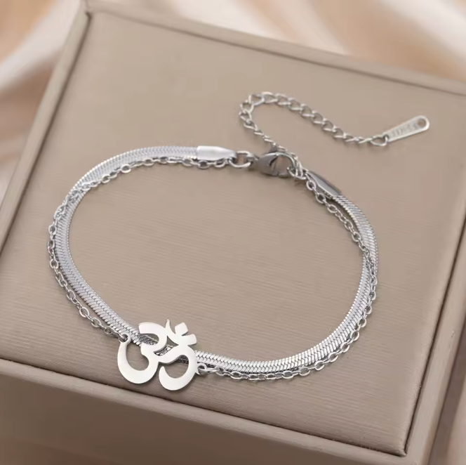 PULSEIRA OM EM AÇO INOXIDÁVEL – PRESENÇA E EQUILÍBRIO
