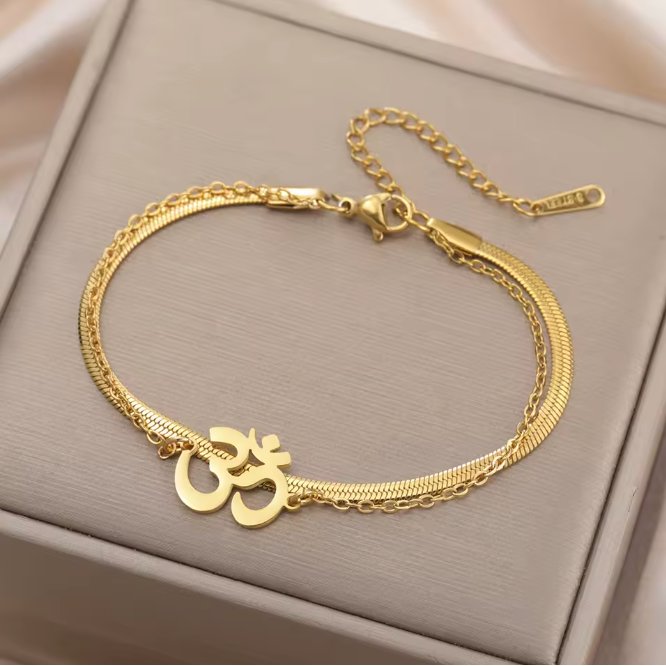 PULSEIRA OM EM AÇO INOXIDÁVEL – PRESENÇA E EQUILÍBRIO