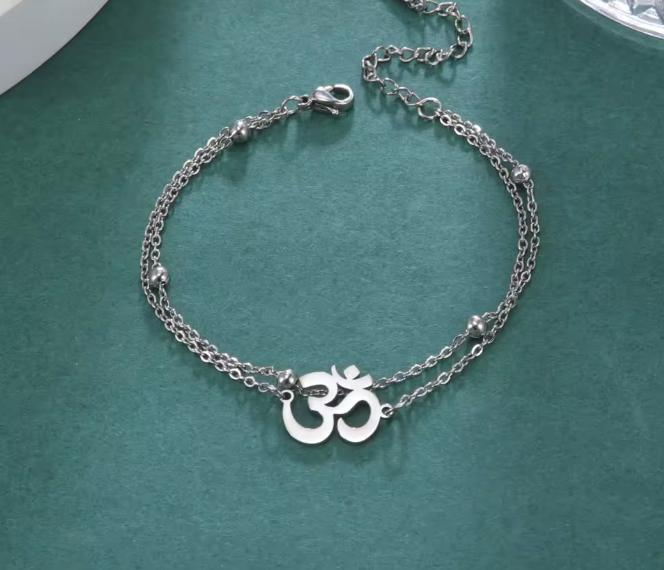 PULSEIRA OM EM AÇO INOXIDÁVEL – PRESENÇA E EQUILÍBRIO